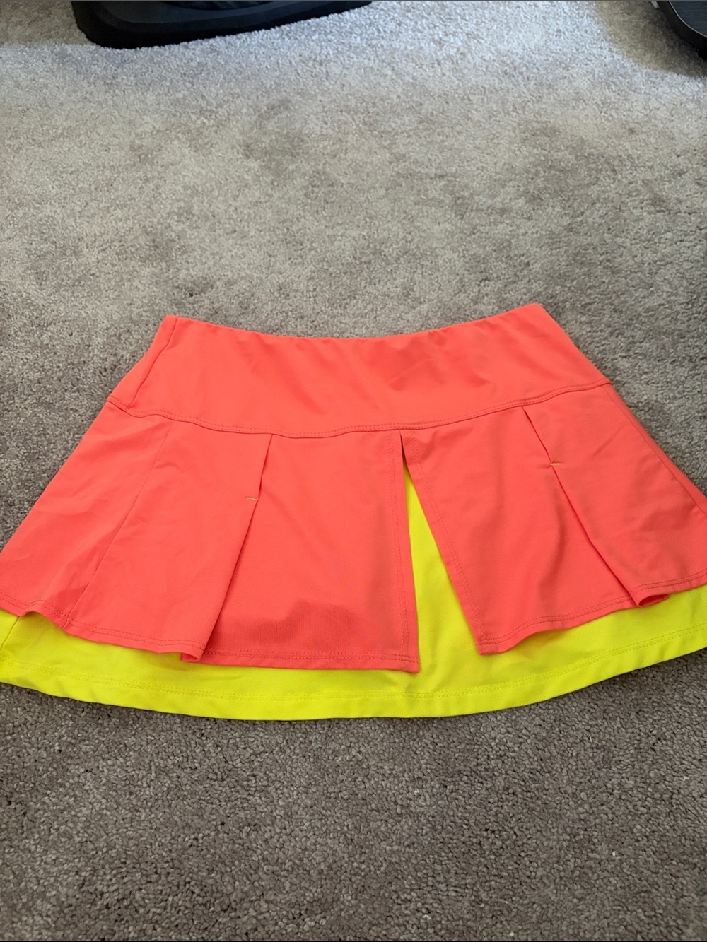 Women’s lucky in love Neon Coral Pleated Skort with Yellow Lining